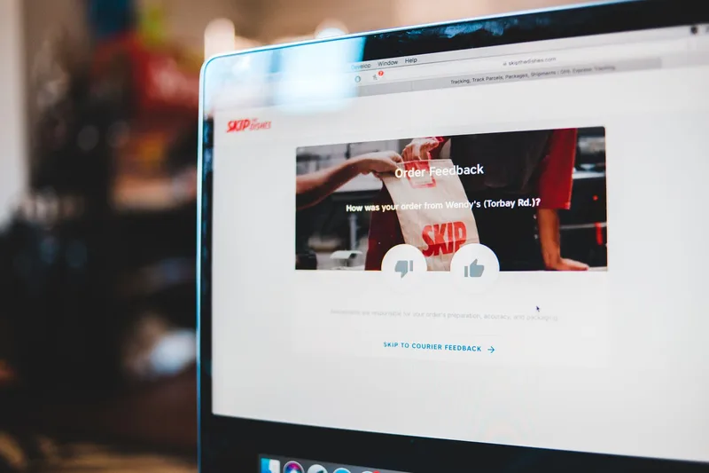 Laptop screen showing an email signup form, representing the opt-in experience a visitor encounters when they find a lead magnet offer